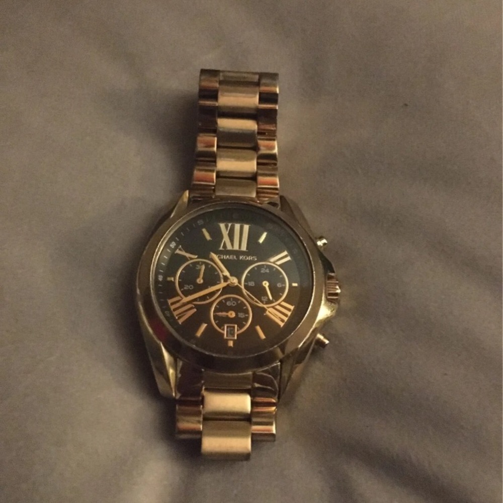 Men’s gold Michael kors watch